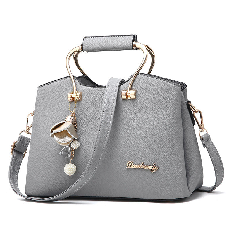 The Street Smart with a little jingle" Shoulder bag with charms