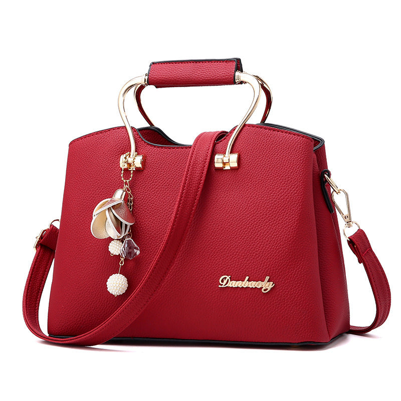 The Street Smart with a little jingle" Shoulder bag with charms