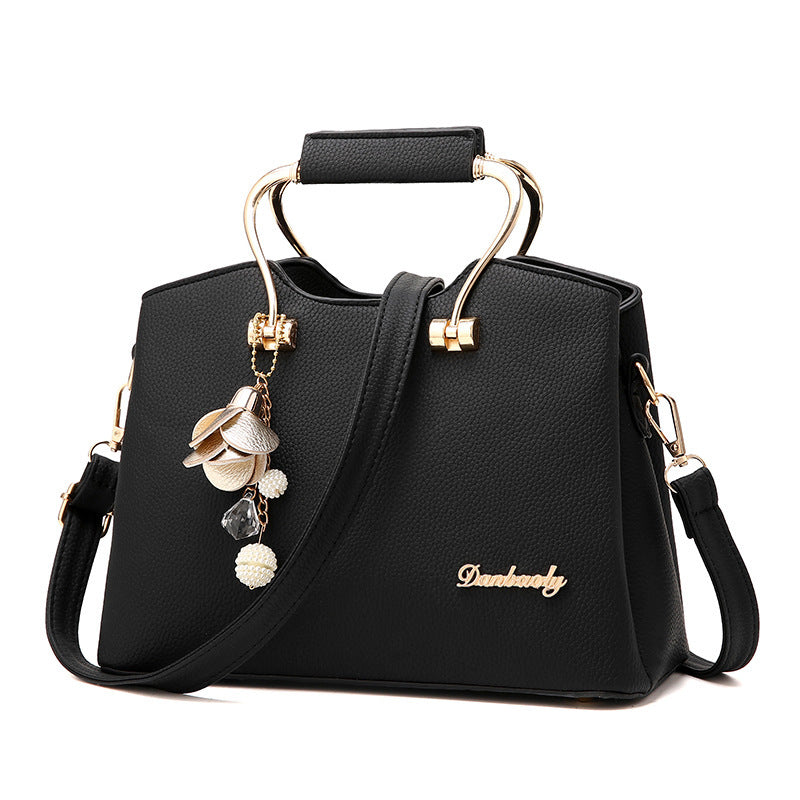 The Street Smart with a little jingle" Shoulder bag with charms