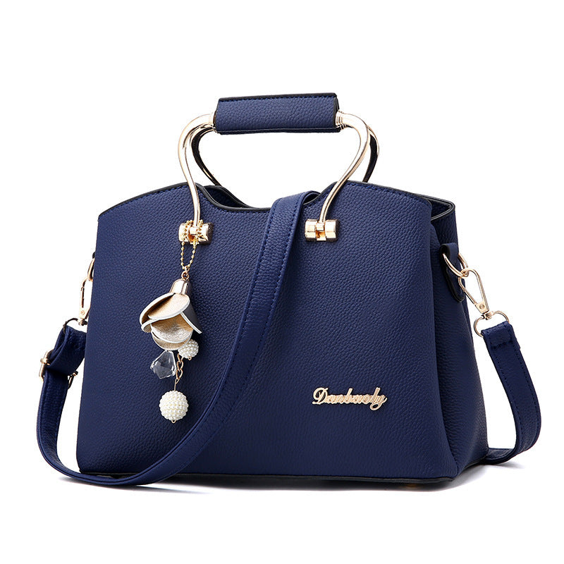 The Street Smart with a little jingle"  Shoulder bag with charms
