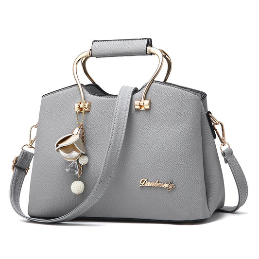 The Street Smart with a little jingle"  Shoulder bag with charms