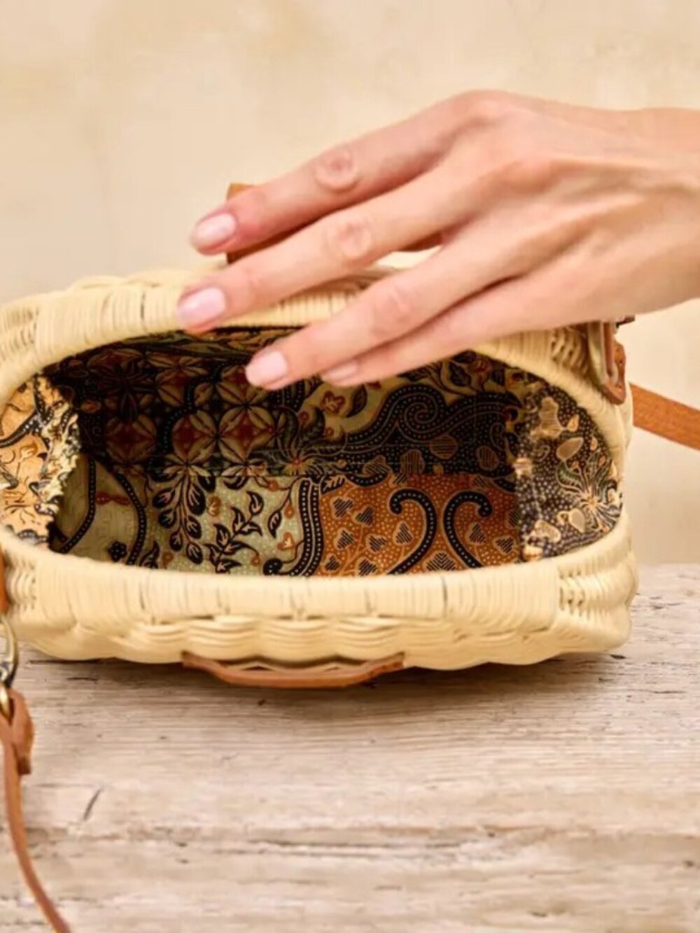Rattan Crossbody Clamshell Clutch with leather accents and strap