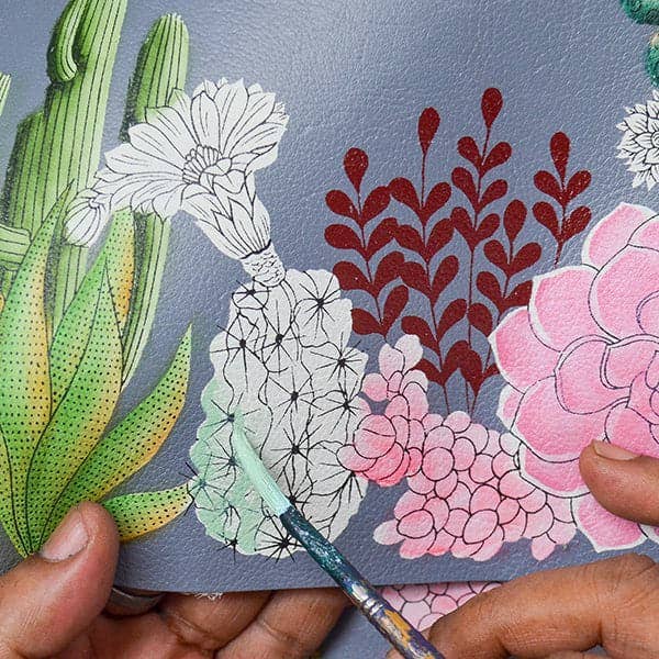 Anuschka Hand-Painted Leather Expandable Travel Crossbody - 550- dusty blue with cactus flowers