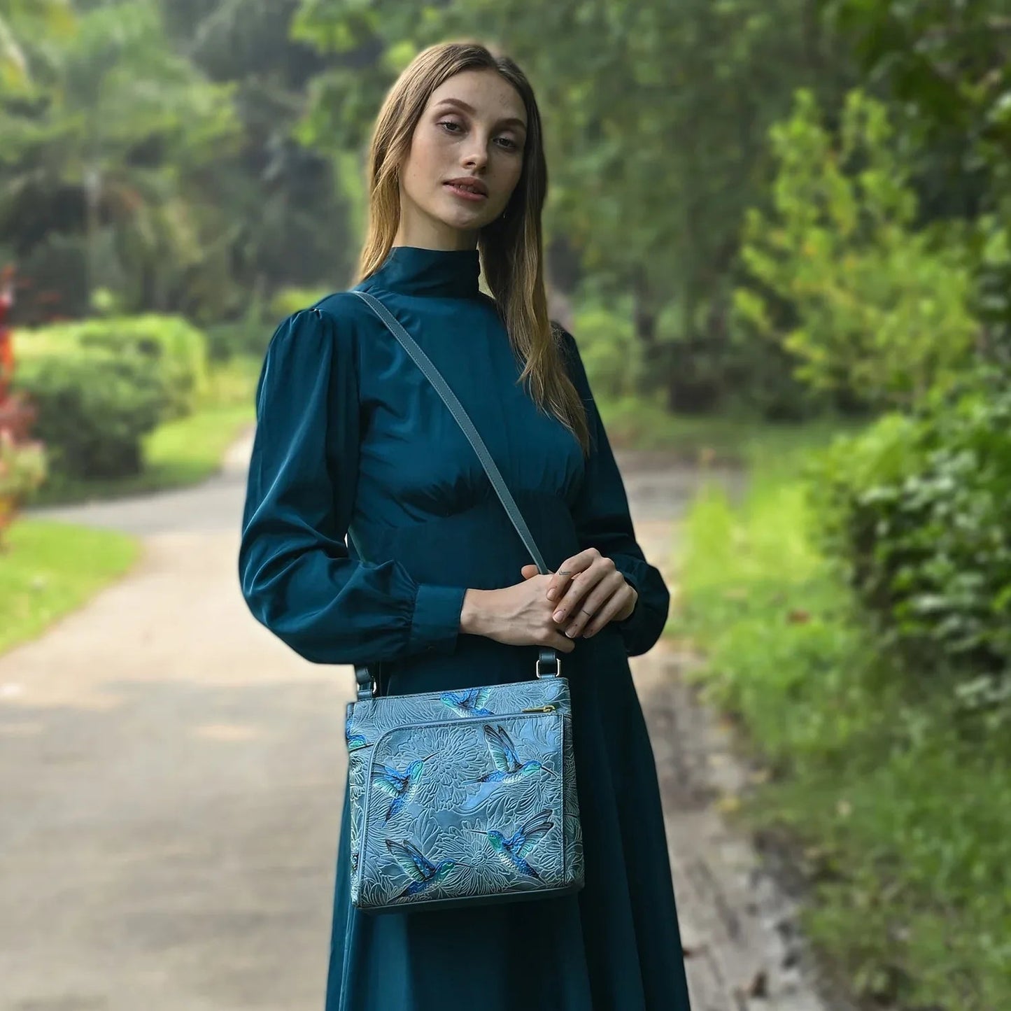 Anuschka tooled hummingbirds in sky blue Crossbody With Front Zip Organizer - 651